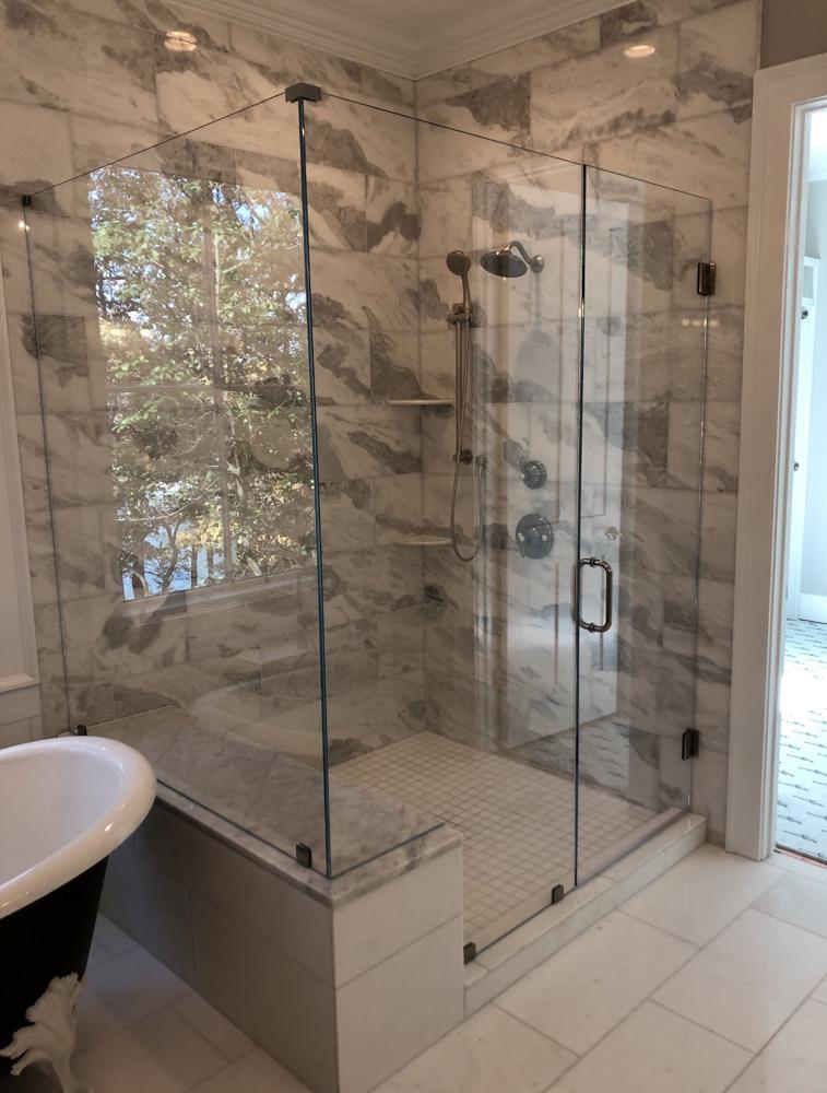 frameless glass shower enclosure.